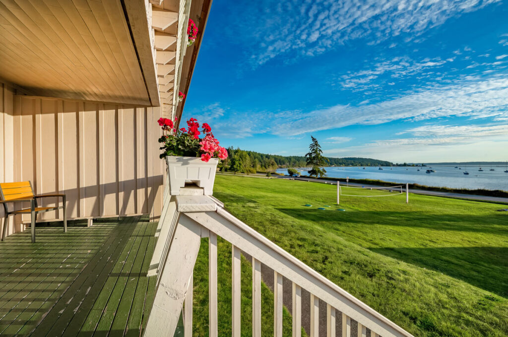 Private sunset deck offering beautiful outdoor views from the Orca Deluxe Room.