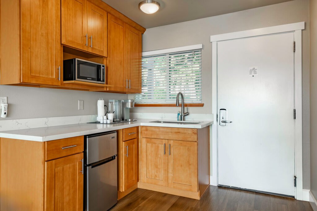 Well-equipped room kitchenette complete with a mini-fridge and microwave.