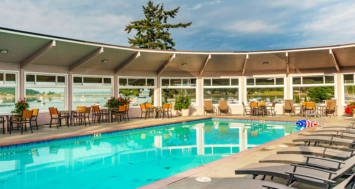 Family outdoor pool at Lopez Islander Resort perfect for summer fun.